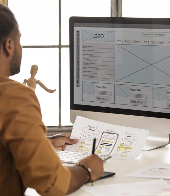 side-view-man-working-with-computer-min